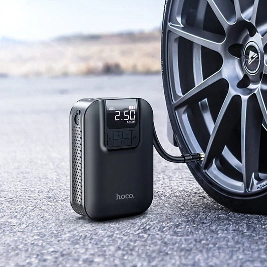 Hoco Portable Smart Air Pump S53 by CSSV FILE, compact air compressor with digital display and nozzle attachments for inflating tires and devices.