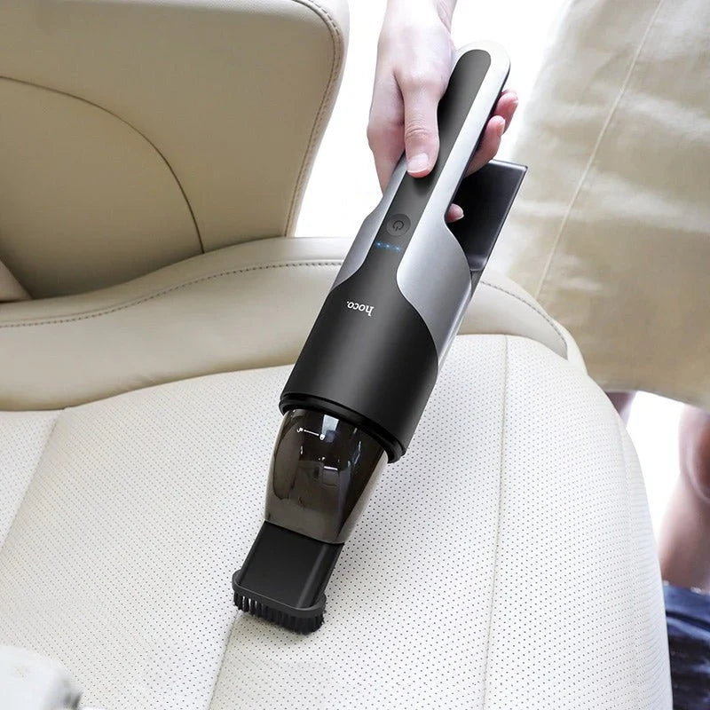Hoco PH16 vacuum car cleaner by CSSV FILE, handheld device with nozzle for cleaning car interiors and upholstery.