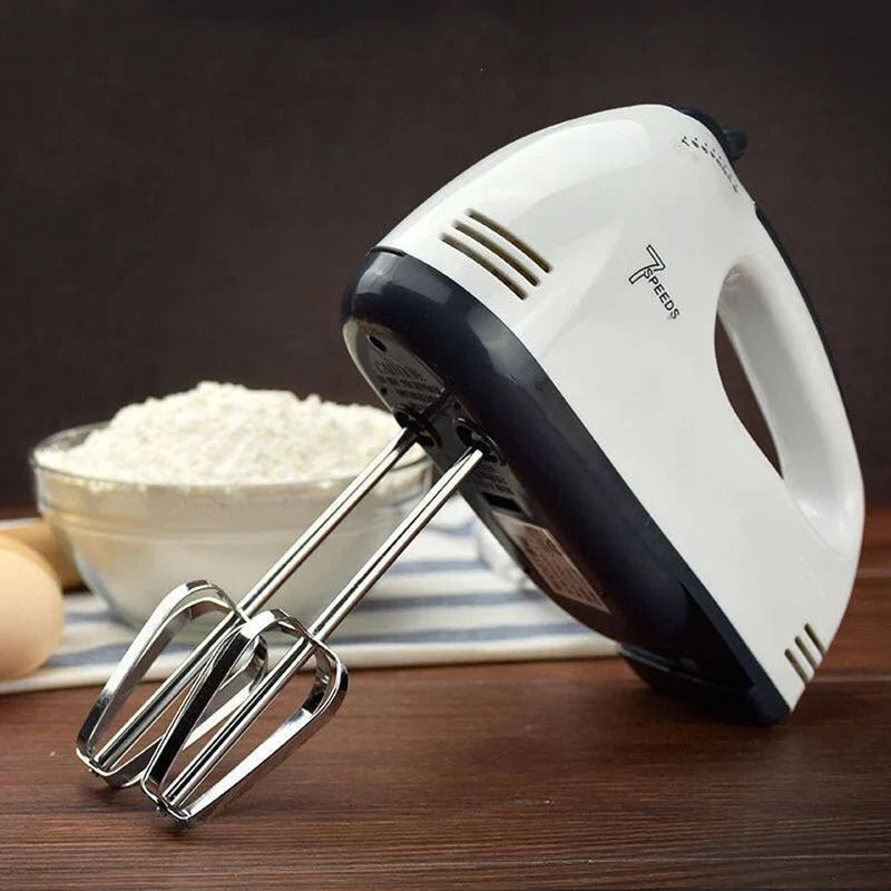 CSSV FILE Super Hand Mixer with multiple attachments, ergonomic handle, and stainless steel beaters for efficient mixing.